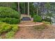 Forest Plantation stone entrance sign surrounded by lush landscaping at 840 Yosemite Dr, Suwanee, GA 30024