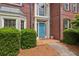 Close-up of the front entrance with brick facade and a charming light blue door at 840 Yosemite Dr, Suwanee, GA 30024