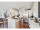 Spacious kitchen with hardwood floors and white cabinets providing ample storage at 840 Yosemite Dr, Suwanee, GA 30024