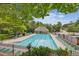 Community pool with lounge chairs at 840 Yosemite Dr, Suwanee, GA 30024