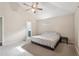 Bedroom with a vaulted ceiling, ceiling fan, and neutral carpet at 2156 Doris Dr, Decatur, GA 30034