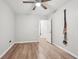 The bedroom has wood-look floors and a ceiling fan to keep the room cool at 2156 Doris Dr, Decatur, GA 30034