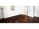 Comfortable bedroom featuring hardwood floors at 807 Woodcliff Dr, Sandy Springs, GA 30350