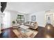 Living room featuring access to outdoor patio, hardwood flooring and lots of natural light at 807 Woodcliff Dr, Sandy Springs, GA 30350