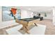 Finished basement with a stylish pool table and comfortable seating area at 1810 Fairoaks Pl, Decatur, GA 30033
