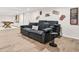 The finished basement has a media center, a pool table, and light wood floors at 1810 Fairoaks Pl, Decatur, GA 30033