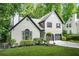 Lovely two-story home with well-manicured lawn and a two-car garage at 1810 Fairoaks Pl, Decatur, GA 30033