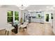 Bright kitchen with stainless steel appliances and adjacent dining area at 1810 Fairoaks Pl, Decatur, GA 30033