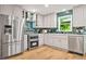 Beautiful kitchen with stainless steel appliances and tile backsplash at 1810 Fairoaks Pl, Decatur, GA 30033