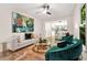 Bright living room with contemporary decor, wood floors, and stylish seating at 1810 Fairoaks Pl, Decatur, GA 30033