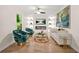 Bright living room with contemporary decor, wood floors, and stylish seating at 1810 Fairoaks Pl, Decatur, GA 30033