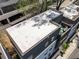 Modern townhome with a rooftop patio, offering stylish outdoor living in an urban setting at 1821 Huntington Hills Nw Ln, Atlanta, GA 30309