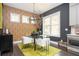 Bright dining room with modern light fixture, large windows, and stylish decor at 1821 Huntington Hills Nw Ln, Atlanta, GA 30309