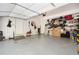Spacious garage with ample storage solutions and epoxy flooring, offering both functionality and style at 1821 Huntington Hills Nw Ln, Atlanta, GA 30309