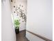 Contemporary staircase featuring a decorative wall art and a view from an upper level at 1821 Huntington Hills Nw Ln, Atlanta, GA 30309