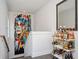 Stairwell area enhanced by a modern art piece and beverage cart, creating a stylish and inviting space at 1821 Huntington Hills Nw Ln, Atlanta, GA 30309