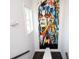 Bright stairwell featuring modern art on the wall and a window providing natural light at 1821 Huntington Hills Nw Ln, Atlanta, GA 30309