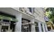 The Metropolitan building features a prominent entrance and classic architectural details at 20 Marietta Nw St # 16A, Atlanta, GA 30303