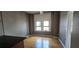 Living space featuring a hardwood floor and windows for natural lighting at 20 Marietta Nw St # 16A, Atlanta, GA 30303