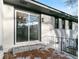 Back porch with white brick exterior, steps to yard, and sliding glass doors at 3215 Pennignton Cir, Atlanta, GA 30354