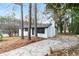 Picture of a white brick home with an extended driveway, offering convenient parking at 3215 Pennignton Cir, Atlanta, GA 30354