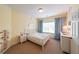 Bright bedroom showcasing a white bed frame and neutral decor at 423 Hunt Ne St, Marietta, GA 30060