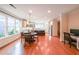 Bright dining area with hardwood floors, modern lighting, and views of the backyard at 423 Hunt Ne St, Marietta, GA 30060