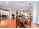 Elegant dining area illuminated by a chandelier, offering a stylish space for gatherings at 423 Hunt Ne St, Marietta, GA 30060