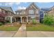 Charming home with stone accents and a beautifully landscaped front yard at 423 Hunt Ne St, Marietta, GA 30060
