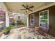 Relaxing front porch with swing, chairs, and overhead fan at 423 Hunt Ne St, Marietta, GA 30060