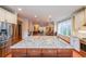 Bright open kitchen features stainless steel appliances, granite countertops, and an oversized center island at 423 Hunt Ne St, Marietta, GA 30060