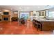 Spacious living area boasts hardwood floors, a decorative fireplace, and seamless flow into the kitchen at 423 Hunt Ne St, Marietta, GA 30060