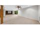 Wide view of basement featuring carpet, bar area, and an outside view at 1665 Chevron Way, Sandy Springs, GA 30350