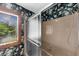 Bathroom featuring a window and floral wallpaper at 1665 Chevron Way, Sandy Springs, GA 30350