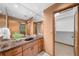 Bathroom with granite countertop vanity and large mirrors at 1665 Chevron Way, Sandy Springs, GA 30350