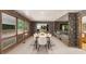 Bright dining room with large windows and contemporary table at 1665 Chevron Way, Sandy Springs, GA 30350