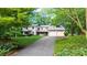 Charming two-story home with a well-maintained lawn and a two-car garage at 1665 Chevron Way, Sandy Springs, GA 30350