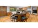 Open kitchen featuring a large island with granite counters and seating for casual dining at 1665 Chevron Way, Sandy Springs, GA 30350