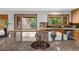 Close up of a kitchen island featuring a granite countertop, copper faucet, and modern appliances at 1665 Chevron Way, Sandy Springs, GA 30350