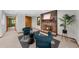 Cozy living room with brick fireplace, mantle, and seating at 1665 Chevron Way, Sandy Springs, GA 30350