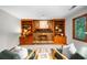 Inviting living room featuring a cozy fireplace with built-in bookshelves and stylish decor at 1665 Chevron Way, Sandy Springs, GA 30350