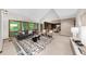 Spacious living room with abundant natural light, comfortable seating, and elegant decor at 1665 Chevron Way, Sandy Springs, GA 30350