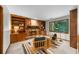Cozy living room with a brick fireplace, built-in shelves, and natural light at 1665 Chevron Way, Sandy Springs, GA 30350