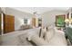 Bright main bedroom with multiple windows, neutral walls, and a ceiling fan at 1665 Chevron Way, Sandy Springs, GA 30350
