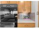 Contemporary kitchen featuring a built-in oven and white tile backsplash at 1665 Chevron Way, Sandy Springs, GA 30350