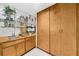 Modern wet bar with cabinets, shelves, and a sink at 1665 Chevron Way, Sandy Springs, GA 30350