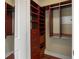 Walk-in closet offering custom shelving, drawers, and ample storage space at 201 W Ponce De Leon Ave # 515, Decatur, GA 30030