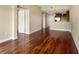 Bright living room featuring gleaming hardwood floors and an open floor plan at 201 W Ponce De Leon Ave # 515, Decatur, GA 30030
