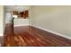 Hardwood flooring throughout the spacious living area, with a view into the kitchen at 201 W Ponce De Leon Ave # 515, Decatur, GA 30030