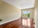 The bright, airy living area features hardwood flooring and access to a private balcony at 201 W Ponce De Leon Ave # 515, Decatur, GA 30030